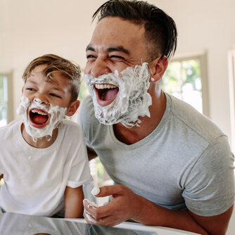 Man,And,Little,Boy,With,Shaving,Foam,On,Their,Faces